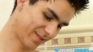 Pretty young gay dude wanks his dick while in underwear
