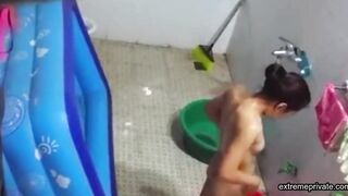 Asian stepdaughter spied in the bathhouse