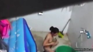 Asian stepdaughter spied in the bathhouse