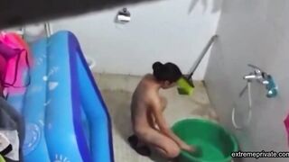 Asian stepdaughter spied in the bathhouse
