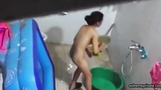 Asian stepdaughter spied in the bathhouse