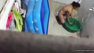Asian stepdaughter spied in the bathhouse