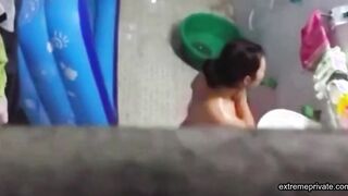 Asian stepdaughter spied in the bathhouse