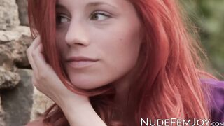 Pale redhead shows off her impeccable hips and her titties