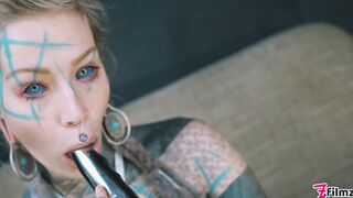 Anuskatzz shoves a stainless steel dildo up her ass