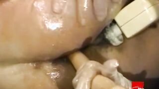 Bushy lesbo gets her cunt and booty toyed into wild 3 way