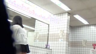 Japanese women use public restroom to pee and get filmed