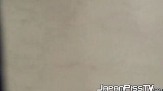 Pissing Japanese babe enjoying her time in public toilette