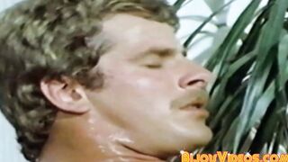 Man with muscles cum while being watched in vintage clip