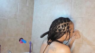 Petite ebony babe Yazmine with tiny tits washes hairy crotch