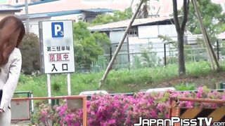 Classy Japanese redhead finds a secret place to pee