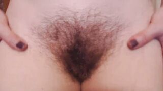 Loud moaning MILF Emerald Ostara rubs bushy pussy