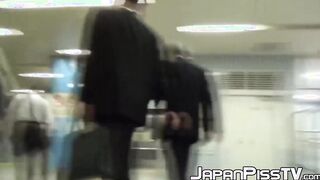 Japanese ladies taped pissing in public bathroom