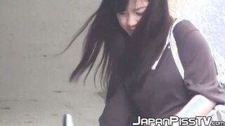 Gorgeous Japanese girls spotted taking a leak in forest