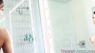 Beautiful ladyboy masturbates under a hot shower