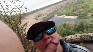 Hoe brought stranger to nature and filled her mouth wth