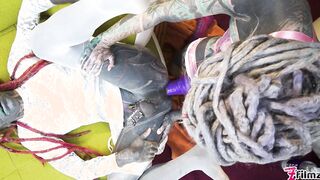 Tattooed trans sissy gets ass fucked with a strap-on