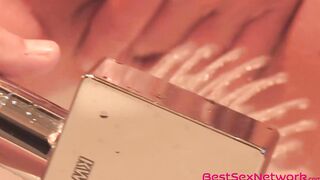 Blonde Mandi Eve rubs her pussy and stimulates with water