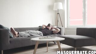 Hot blond ripped hunk loves tugging his dick on a couch