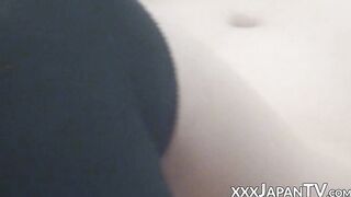 Reality Asian chick with knee high socks masturbating