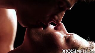 Erotic couple covered in water makes love in the dark