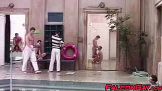 Andrej gulps down Michal's uncut cock in the middle of a public pool