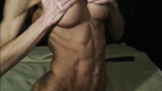 ripped MILF flexing biceps