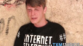 Blond twink fed with two dicks out in the open