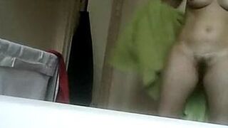 hidden camera films stepmother's hairy pussy