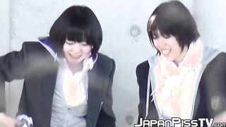 Naughty Japanese schoolgirls squirting piss in public