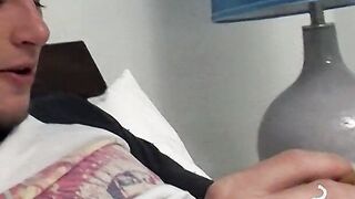 Tempting twink played with his cock and blowing smoke