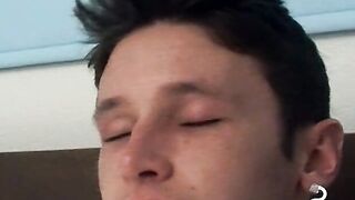 Tempting twink played with his cock and blowing smoke