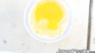 Kinky chick from Japan keeps track of how much she can pee