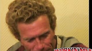 Mature dude strokes his massive cock while smoking a cigar
