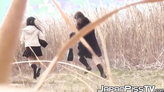 Japanese schoolgirls stopped to take a warm pissing outdoor