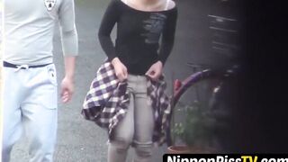 Japanese teenie absorbing herself with warm pee