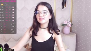 Kristina Frolova puts the palm of her hand in her small ass