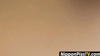 Debaucherous Asian student peeing hard out in the open
