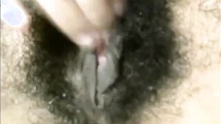 Arab mom Zina rubs extreme hairy cunt
