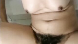 Arab mom Zina rubs extreme hairy cunt