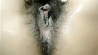 Arab mom Zina rubs extreme hairy cunt