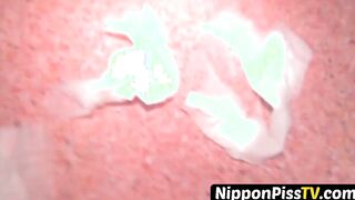 Japanese minx has shaggy pussy peeing in lobby