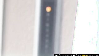 Japanese chick rubs herself outside before furtively peeing