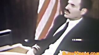 Mature general barebacks young soldier on his office desk