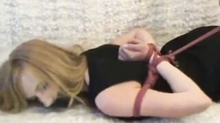 watching my hogtied stepdaughter struggling