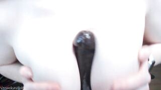 Freaky big boobed ginger titifucking a long african vibrator and anal