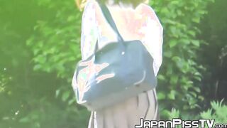 Japanese lady finds a secluded place to pee in public space
