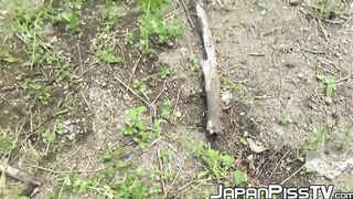 Japanese lady finds a secluded place to pee in public space
