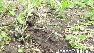 Japanese lady finds a secluded place to pee in public space
