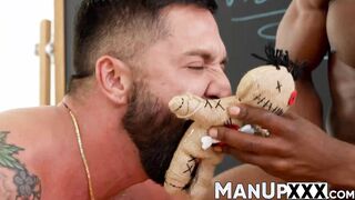 Man with a beard slaps himself while being restrained
